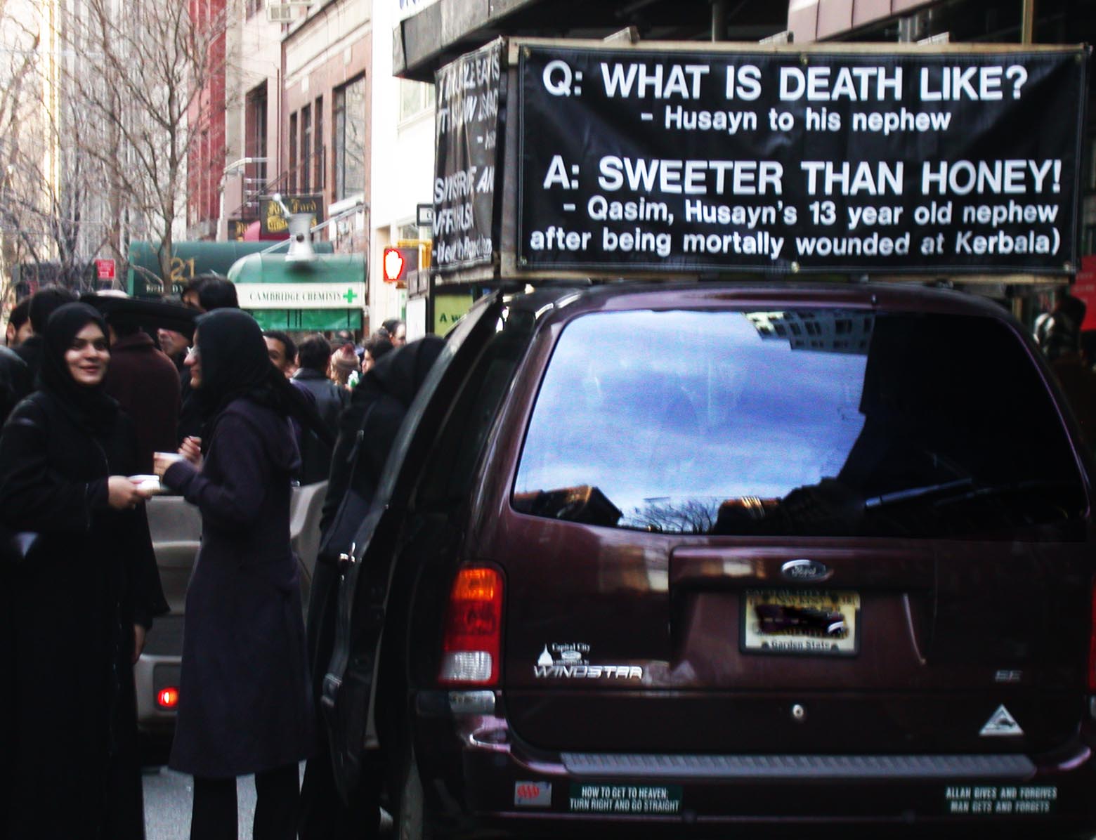 Shiite Muslims' public devotion to a martyr of 670 AD as a symbol of overcoming spiritual darkness is a startling sight in Manhattan but similar to other religions' honoring of their martyrs.