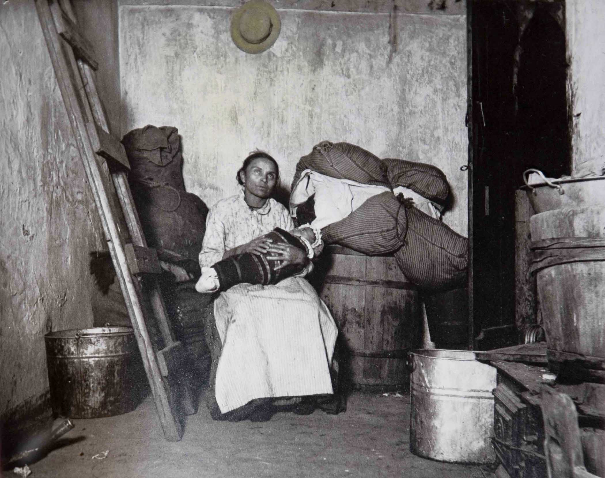Jacob Riis' "The Lower East Side Madona," slightly colorized to emphasize the halo effect in Riis' composition.